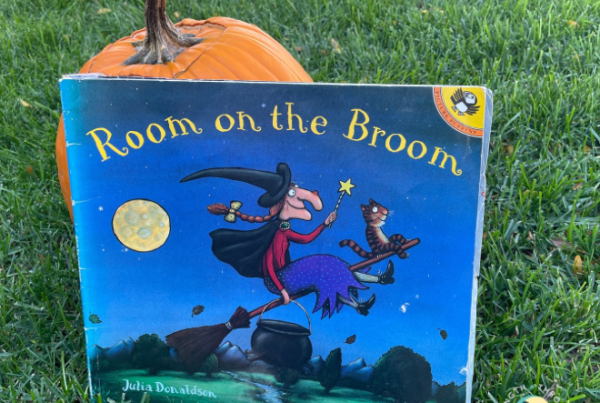 Room on the Broom story in front of pumpkin